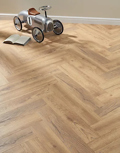 Swiss Krono Herringbone - Peterson Oak Nature 8mm Laminate Flooring. 1.23m² Pack 3 Swiss Krono Herringbone - Peterson Oak Nature 8mm Laminate Flooring. 1.23m² Pack